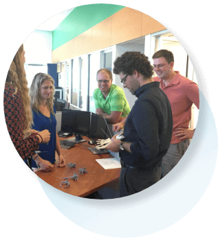 engineers talking around a desk